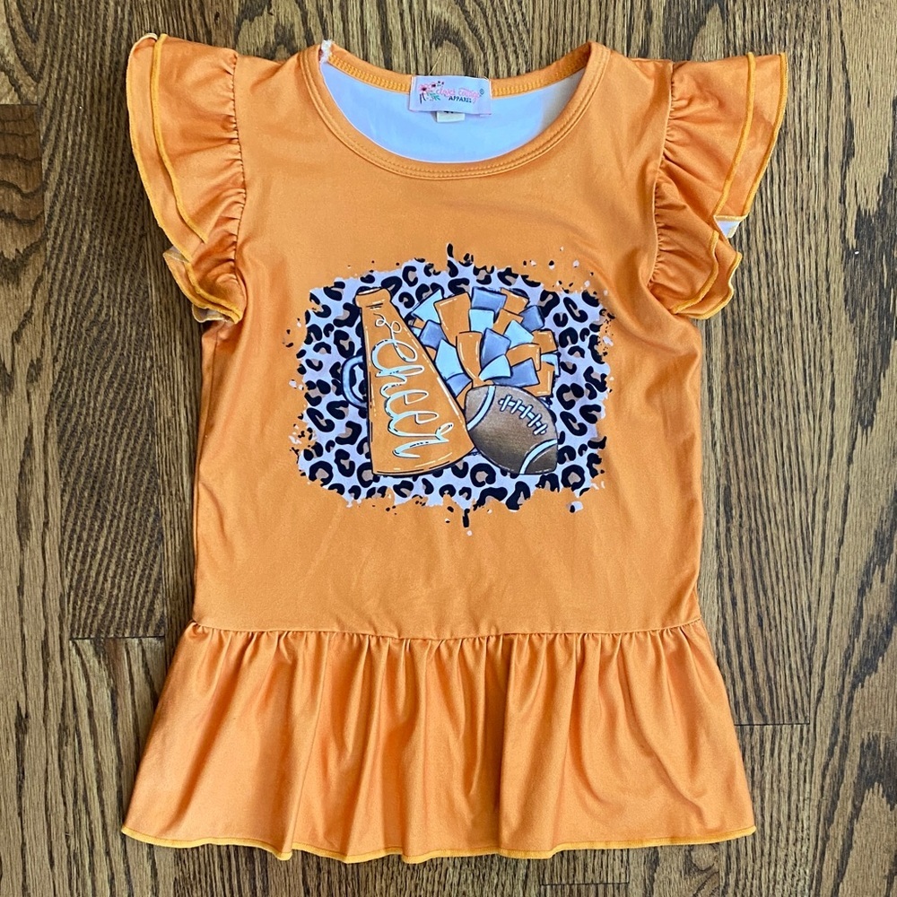 Orange ruffle sleeve football/cheer dress, size 4T. Excellent condition